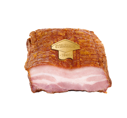 Roasted pork belly, Serve-over counter – Saftiges Bauchfleisch vom Schwein mit Kruste. Deftig mit Kümmel und einem Hauch Knoblauch gewürzt, im Ofen goldbraun gebacken – frisch aufgeschnitten an der Bedienungstheke.